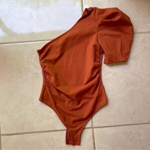 Free people one sleeve puff bodysuit